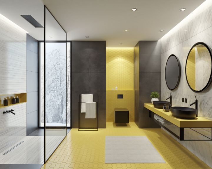 Modern bathroom remodel in yellow and black.