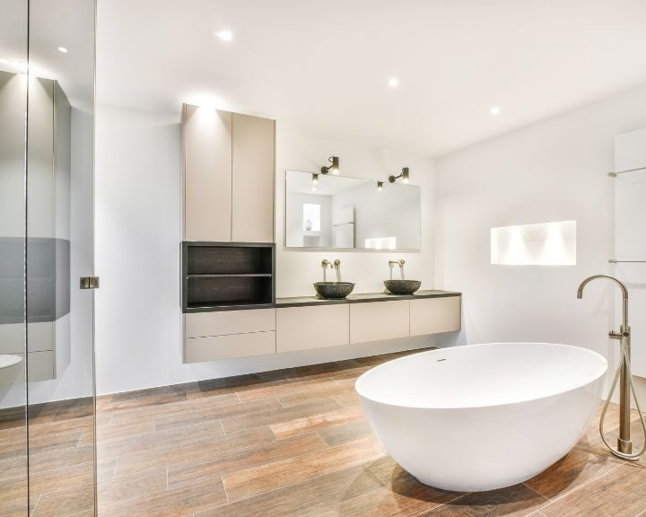 A modern bathroom with a large tub.